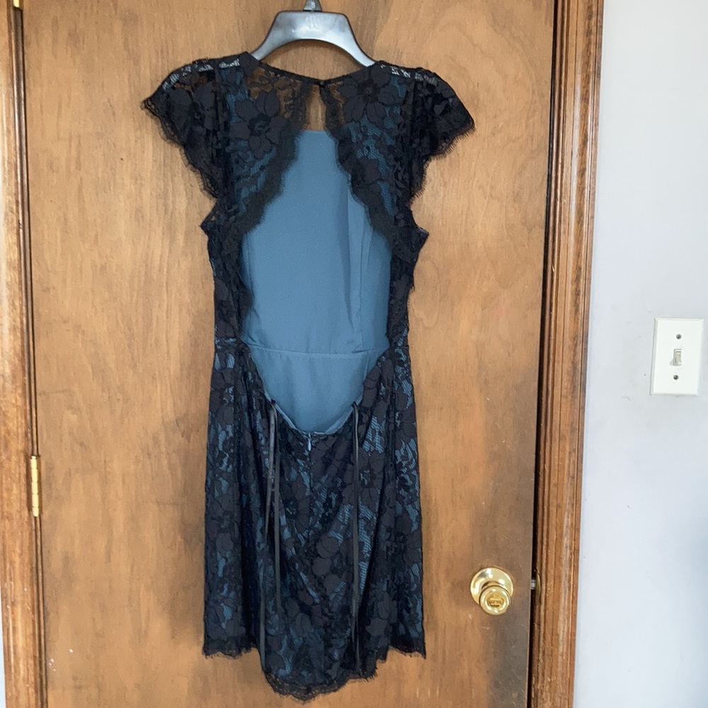 NWOT BCBGeneration dress floral lace with cut out in back part size 8